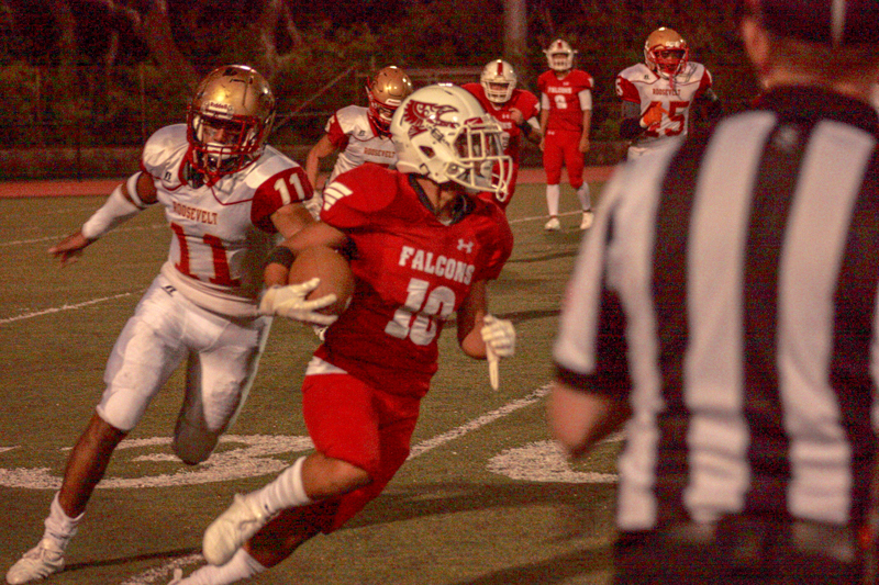 Receiver Brayden Miguel carries the ball up the field on the play against Roosevelt Friday, Aug. 31. Photo by Cassandra Zayas 2018.