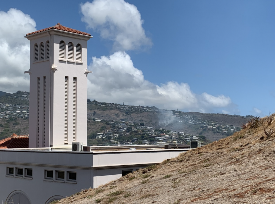 Kaimuki Fire Station with a plume of smoke behind it. Drier months and sparse rainfall have made the island more conducive to fire hazards, enabling small sparks and other starters to combust quickly and easily. Photo and caption by Virgil Lin 2020.