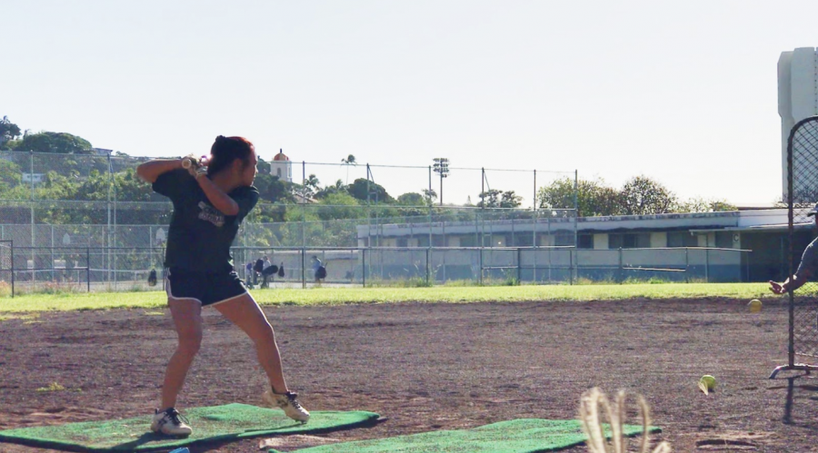 Daynna Mekaru is swinging for the fences as she practices on Dec. 6, at Roosevelt High School softball field so she can be ready for her upcoming season as a sophomore at Mid-Pacific Institute. All public parks are currently open for anyone who wants to exercise, practice, or have a picnic with family or friends. The guidelines for parks in Tier Two are five people maximum and no masks when exercising; however, masks are highly recommended if you’re not 6 feet away from a person inside the park. Students should be going to their local parks and staying in shape, especially if they’re planning on playing for a Kalani sports team which is tentatively set to resume in 3rd Quarter. Photo and caption by Kylie Tanimura. 
