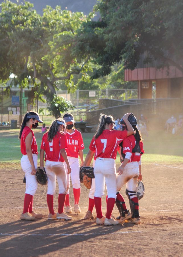 The Falcons take a timeout after the sixth inning to allow them to recuperate and stop Kaiser's scoring momentum. Photo by Shyloh Morgan (12).