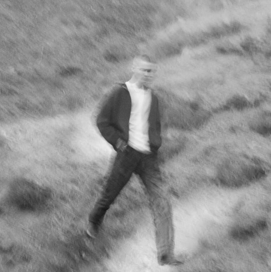 Austin Sanders full release of his remake of Happier Than Ever on YouTube features a blurry black-and-white photo of him and not much else. Sanders (ATSN) is a TikToker whose remake of Billie Eilishs song Happier Than Ever went viral with over 20 million views. Screenshot of Sanders release.