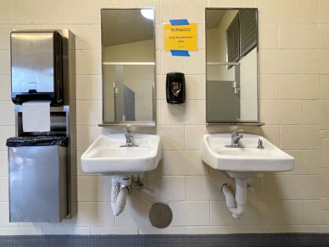 A sign in the Girls bathroom by the Kalani gym asks users to be respectful. In October, the sink was torn off the wall by vandals. “The behaviors encouraged by these Tik Tok challenges will not be tolerated by our schools, The Department of Education (DOE) said in a letter sent out Tuesday, Oct. 5. These challenges have escalated beyond minor pranks and are serious offenses that can lead to severe disciplinary consequences. Offenders will be prosecuted to the full extent of the law and face student disciplinary action.” Photo by Ka Leo staff. 