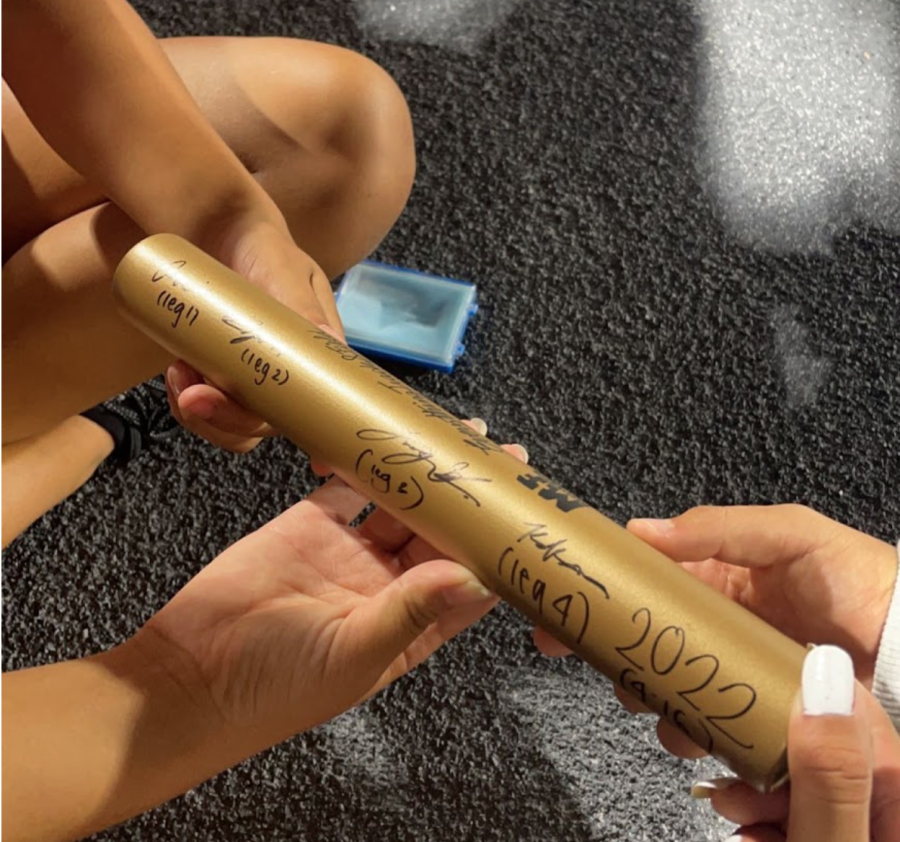 We signed the baton from States. We hold the current school record in the 4x400m relay (so it’s special). 