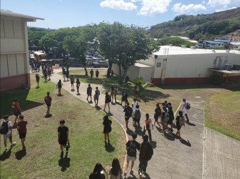 Students walk between classes during the mid-morning break at Kalani High School. Public schools in Hawaii do not enforce uniform policies.  