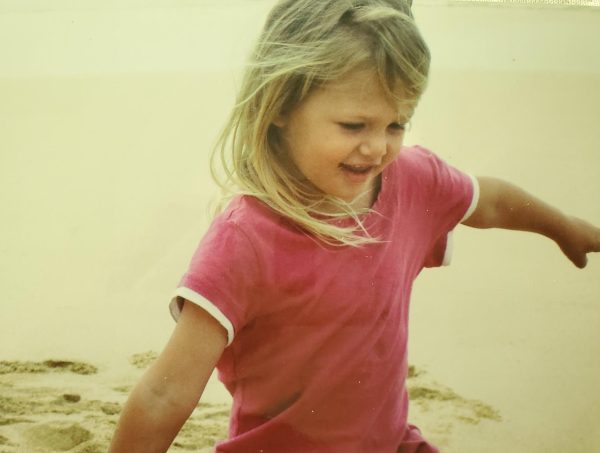 I wander the beach at 4-years old. My favorite color is pink. 
(Photo by David Washburn) 