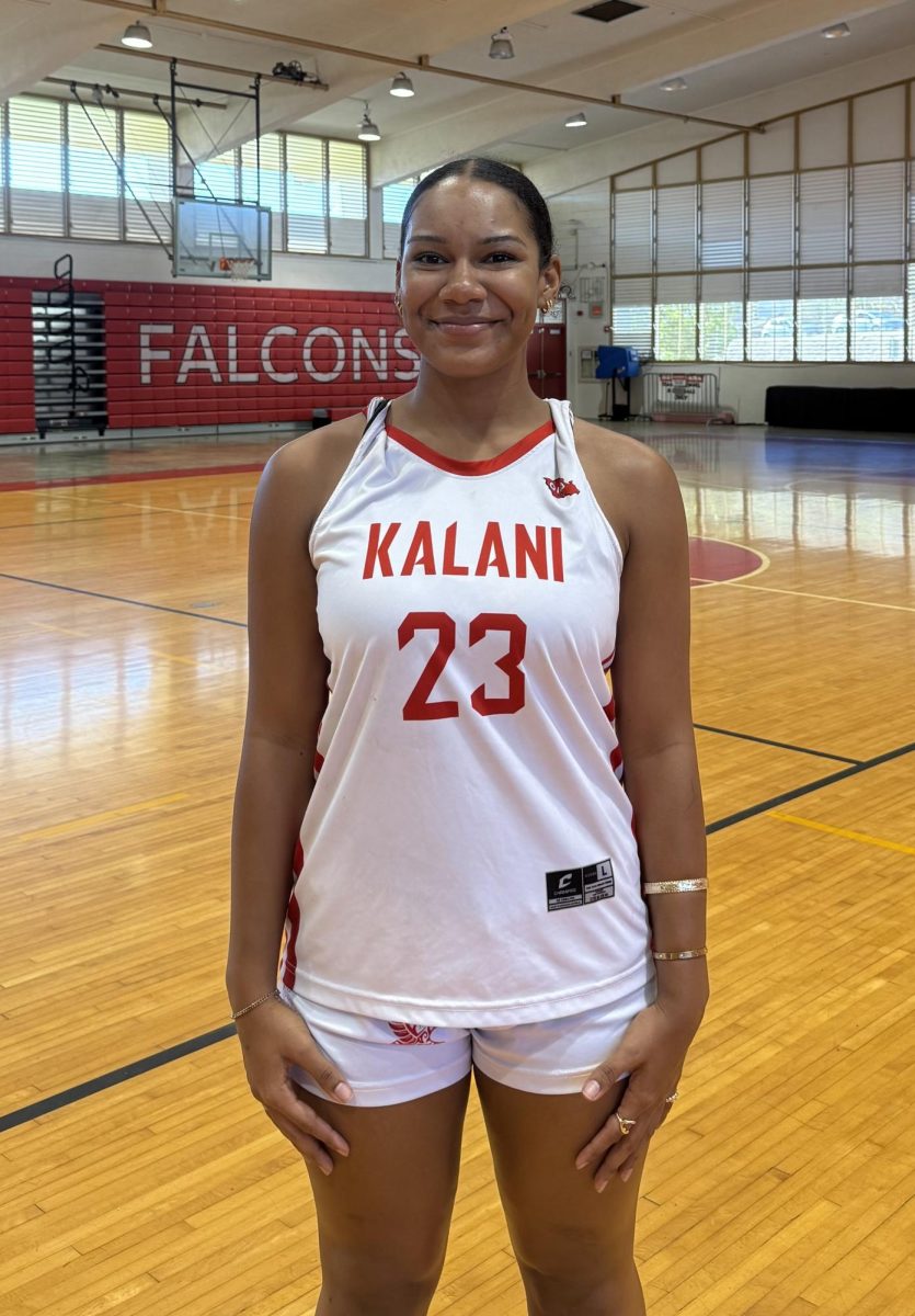 Senior Alina Stephenson stands in the Kalani High School gym, where she has spent years competing as a multi-sport athlete. After suffering a second ACL tear just before her final season, she has transitioned to a leadership role, helping her teammates by offering a new perspective from the sidelines. 